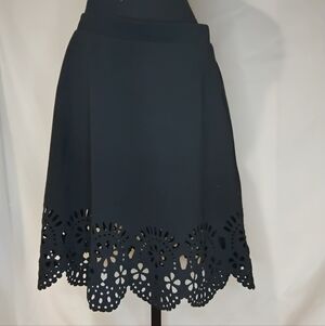 Chic Black A-Line Skirt with Cut-Out Hem